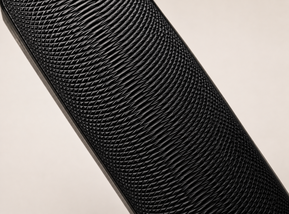 Macro of the milled putter face, showing the diamond mill pattern